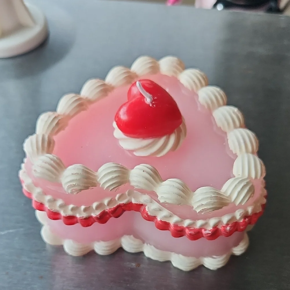 Heart-Shaped Pink Layered Candle with Red Cherry Accent
